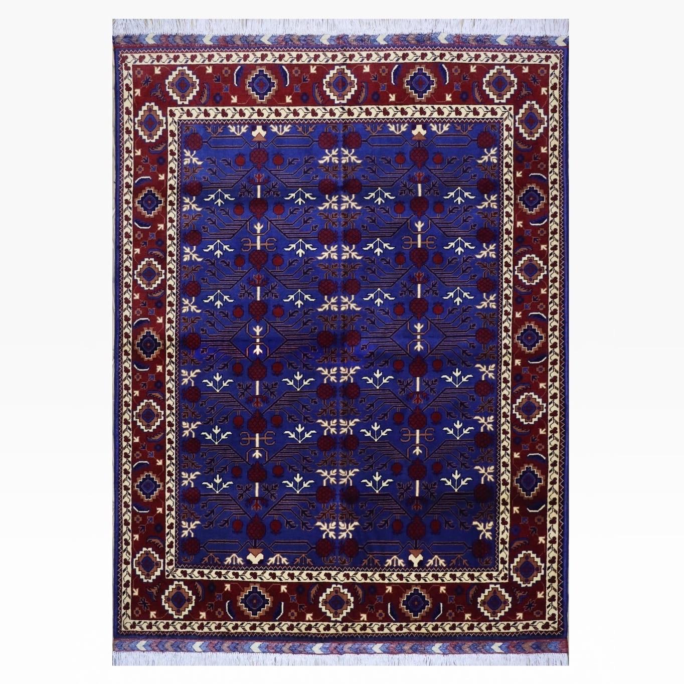A rectangular rug with a deep blue field of small motifs and a red border.
